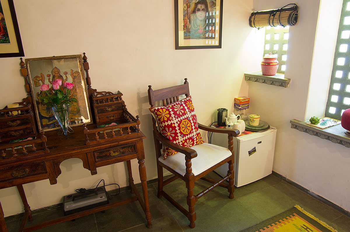 The sitting room area is dressed with traditional antique