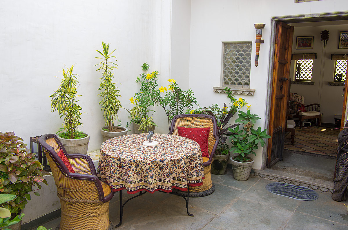 Outside the bedroom is the 'breakfast terrace' where guests enjoy their morning coffee.