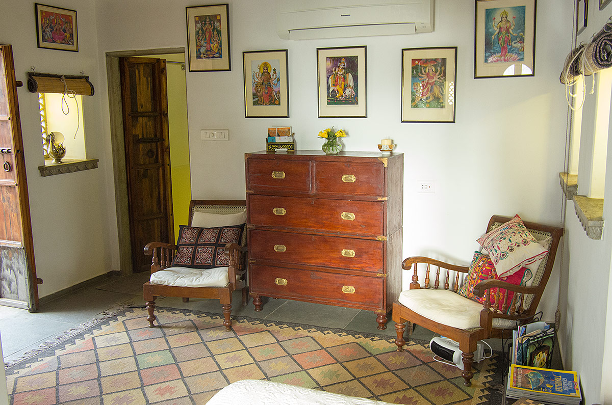 Apartment is furnished with traditional antiques sourced from the local area and vintage textiles from Gujarat.